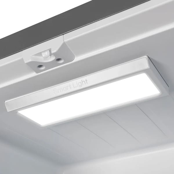 Interior view of the Forno 30-inch refrigerator in white, highlighting the bright, energy-efficient LED lighting that illuminates the shelves and compartments for clear visibility.