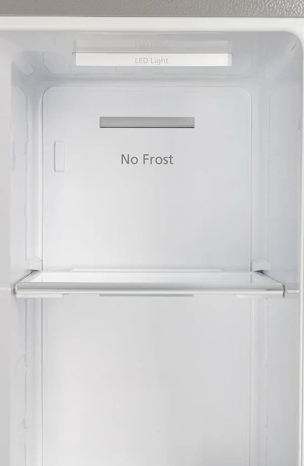 Interior view of the FORNO 33-inch side-by-side refrigerator in stainless steel, displaying organized shelving, spacious compartments, and door bins for efficient food storage.