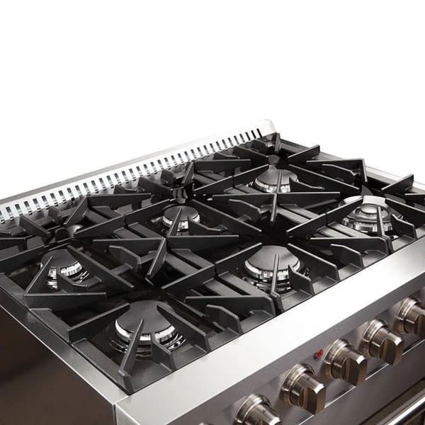 Left angle view of the FORNO 36-inch gas range cooktop featuring multiple Italian burners, continuous cast iron grates, and stainless steel finish—part of the 3-piece appliance package.