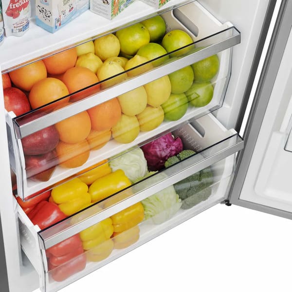 Detailed view of a lower interior drawer in the FORNO pro-style refrigerator from the 3-Piece Appliance Package, featuring a transparent design with ergonomic pull handle and smooth sliding mechanism for efficient food storage and accessibility.