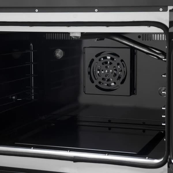 Close-up of the convection fan inside the FORNO Galiano 30-Inch French Door Gas Range in black, set against a vibrant blue enamel oven interior, designed for even heat distribution and consistent cooking performance.