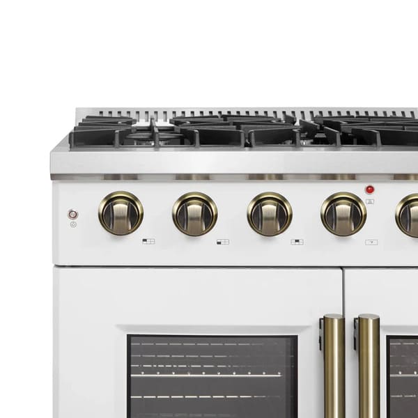 Close-up view of the control knobs on the FORNO Galiano 36-Inch French Door Gas Range in white, showcasing brass-accented bezels and illuminated indicators for precise burner and oven control.