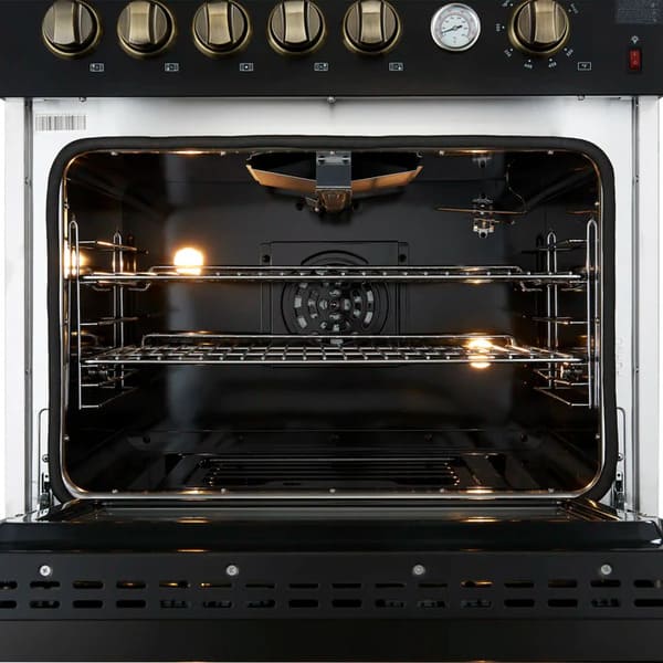 Interior view of the FORNO Giovanni 30-Inch Gas Range oven in black, featuring a vibrant blue enamel finish, convection fan, and durable multi-level oven racks.