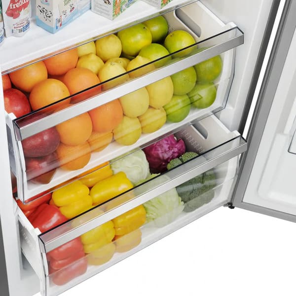 Open freezer drawer of FORNO Maderno Convertible Refrigerator-Freezer, showing spacious interior with stainless steel finish and organized storage compartments.