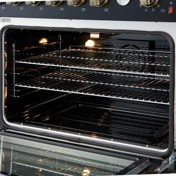 Right-angled view of the oven interior on the FORNO Marco 36-Inch Gas Range in black, showing the blue enamel finish, convection fan, and durable chrome oven racks for even heat distribution and easy cleaning.