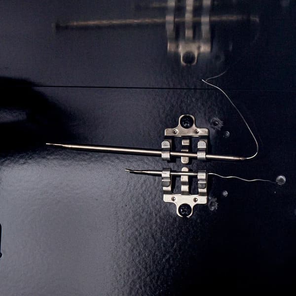 Close-up view of the thermostat dial on the FORNO Marco 36-Inch Gas Range in black, featuring clear temperature markings and a stainless steel knob with a sleek bezel for precise oven control.