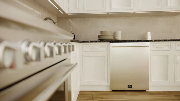 Lifestyle kitchen view featuring the FORNO Pozzo dishwasher from the 4-Piece Appliance Package, seamlessly integrated into modern cabinetry with a sleek stainless steel front panel, offering quiet, efficient cleaning in a contemporary setting.