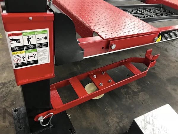 Top view of caster assembly on Triumph NOS9000 Car Lift Four Post for easy mobility