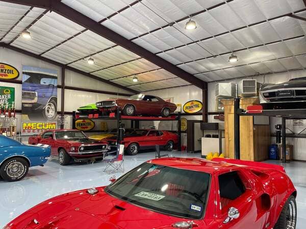 Triumph NSS9000 Four Post Car Lift Installed in Garage