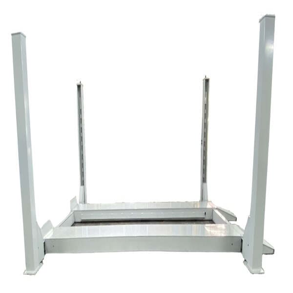 Wide angle of Triumph NTR-32 heavy duty four post lift for trucks, buses, and large fleet vehicles.