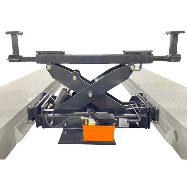 Hydraulic rolling jack platform on Triumph NTR-32 four post lift for wheel and undercarriage service.